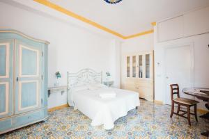Postel nebo postele na pokoji v ubytování B&B Orto Paradiso