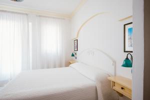 Postel nebo postele na pokoji v ubytování B&B Orto Paradiso