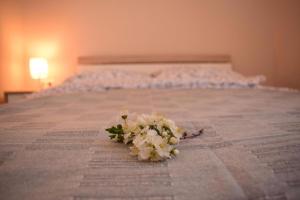 Posteľ alebo postele v izbe v ubytovaní Vadszőlő Apartman