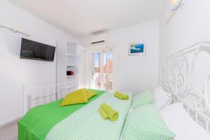 Postel nebo postele na pokoji v ubytování Sea Pearl Residence - Top beachfront location apartments in Bol centre