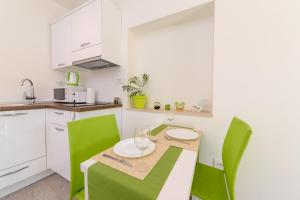 Kuchyň nebo kuchyňský kout v ubytování Sea Pearl Residence - Top beachfront location apartments in Bol centre