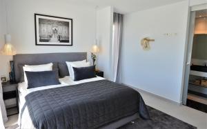 En eller flere senge i et værelse på Exclusive Villa Campoamor by NRAS