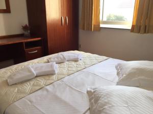 Postel nebo postele na pokoji v ubytování Apartments Šulekić