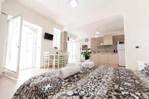 Kuchyňa alebo kuchynka v ubytovaní Ortigia Terrace Sea View