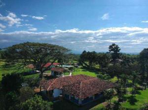 an overhead view of a house with a roof at Finca Hotel Brasilia in La Tebaida +253 photos