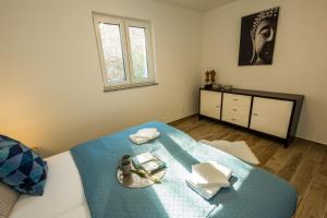 Postel nebo postele na pokoji v ubytování 2Bfree Apartments