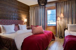Postel nebo postele na pokoji v ubytování Hotel Bügelhof