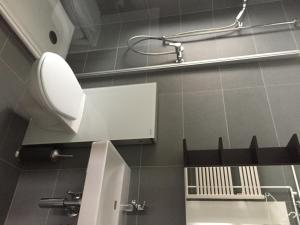 Koupelna v ubytování Immeuble Belvédère