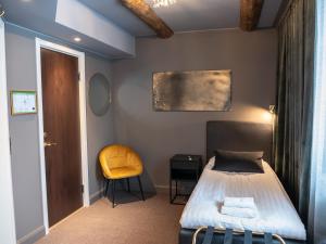 Postel nebo postele na pokoji v ubytování Hotell Gamla Staden