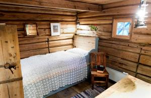 Кровать или кровати в номере Nutheim Gjestgiveri