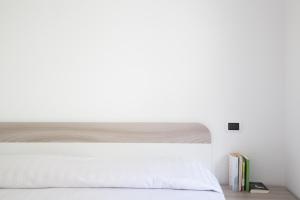 Posteľ alebo postele v izbe v ubytovaní Airone Residence