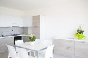 Kuchyňa alebo kuchynka v ubytovaní Airone Residence