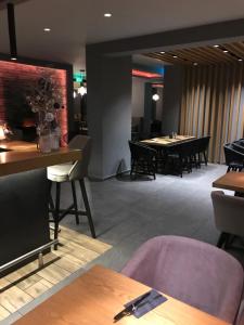 Ein Sitzbereich in der Unterkunft Akropolis Hotel