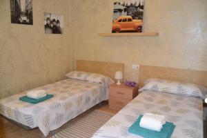 Posteľ alebo postele v izbe v ubytovaní Fabuloso apartamento familiar con piscina en Salou