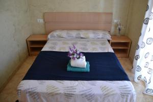 Posteľ alebo postele v izbe v ubytovaní Fabuloso apartamento familiar con piscina en Salou