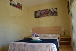 Posteľ alebo postele v izbe v ubytovaní Fabuloso apartamento familiar con piscina en Salou