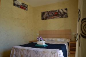 Posteľ alebo postele v izbe v ubytovaní Fabuloso apartamento familiar con piscina en Salou