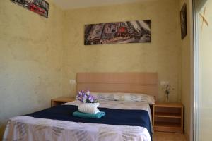 Posteľ alebo postele v izbe v ubytovaní Fabuloso apartamento familiar con piscina en Salou