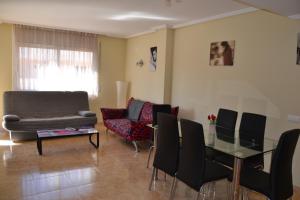 Posedenie v ubytovaní Fabuloso apartamento familiar con piscina en Salou