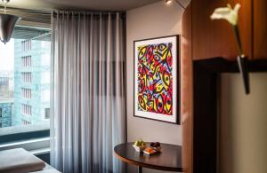 Ein Bett oder Betten in einem Zimmer der Unterkunft Penck Hotel Dresden
