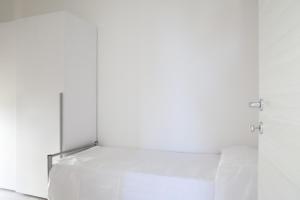 Posteľ alebo postele v izbe v ubytovaní Airone Residence