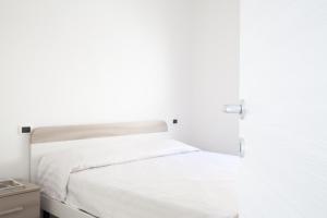 Posteľ alebo postele v izbe v ubytovaní Airone Residence