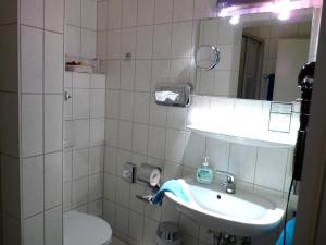 Phòng tắm tại Hotel Geissler