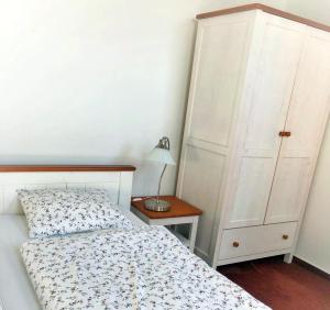 Postel nebo postele na pokoji v ubytování Kap Café
