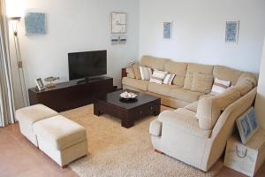 A seating area at Beautiful seafront house