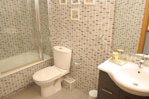 A bathroom at Beautiful seafront house