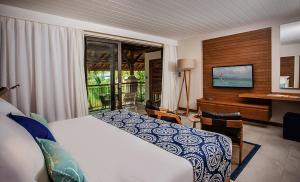Krevet ili kreveti u jedinici u okviru objekta Paradis Beachcomber Golf Resort & Spa