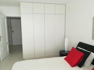 Łóżko lub łóżka w pokoju w obiekcie Parque Tropical I