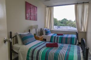 Postel nebo postele na pokoji v ubytování Choice Backpackers + 37 fotografií