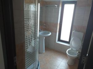 Koupelna v ubytování Agropensiunea GIURCA