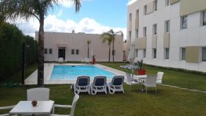 Bazén v ubytování Relax Hôtel Oujda nebo v jeho okolí
