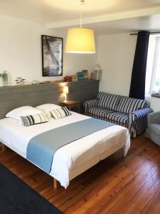 Letto o letti in una camera di La demeure d'Ervée
