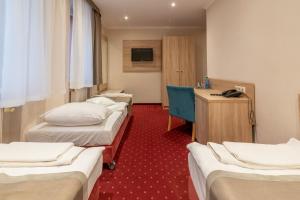 Postel nebo postele na pokoji v ubytování Hotel Texicana + 37 fotografií