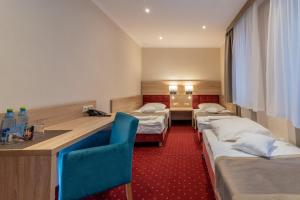 Postel nebo postele na pokoji v ubytování Hotel Texicana