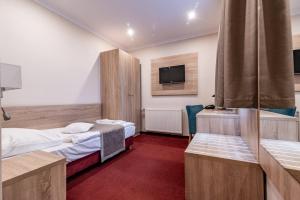 Postel nebo postele na pokoji v ubytování Hotel Texicana