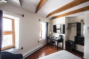 TV a/nebo společenská místnost v ubytování Hotel Belley
