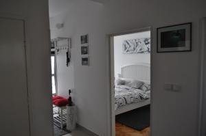 Posteľ alebo postele v izbe v ubytovaní MZ Apartment