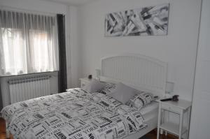 Posteľ alebo postele v izbe v ubytovaní MZ Apartment