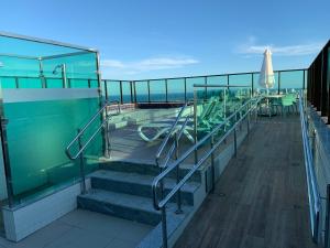 a swimming pool on the deck of a cruise ship at Beach Class in Recife +4 photos