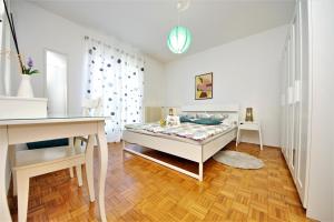 Postel nebo postele na pokoji v ubytování Apartment Ema Old Town
