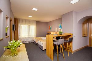 Postel nebo postele na pokoji v ubytování Casa Constanza Hotel Garni