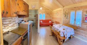 A kitchen or kitchenette at CHALET ETNA MILO Még 37 kép