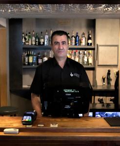 Členové personálu v ubytování Napoli Resturant & Hotell AS