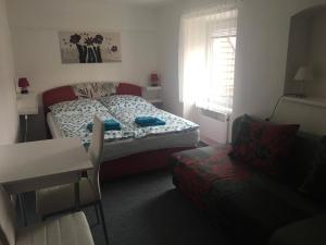 Postel nebo postele na pokoji v ubytování Rodinný penzion
