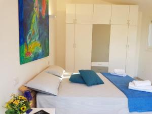 A bed or beds in a room at Villino I Sugheri