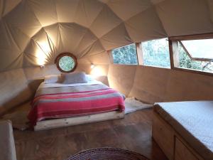 Katil atau katil-katil dalam bilik di Biosfera Lodge
